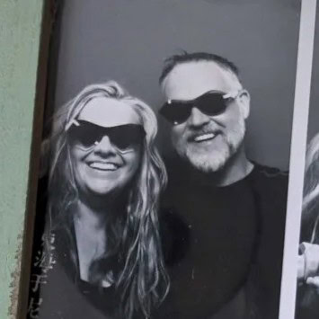 Anna and Niall in sunglasses in a black and white photo-booth portrait marking the Ffin partnership