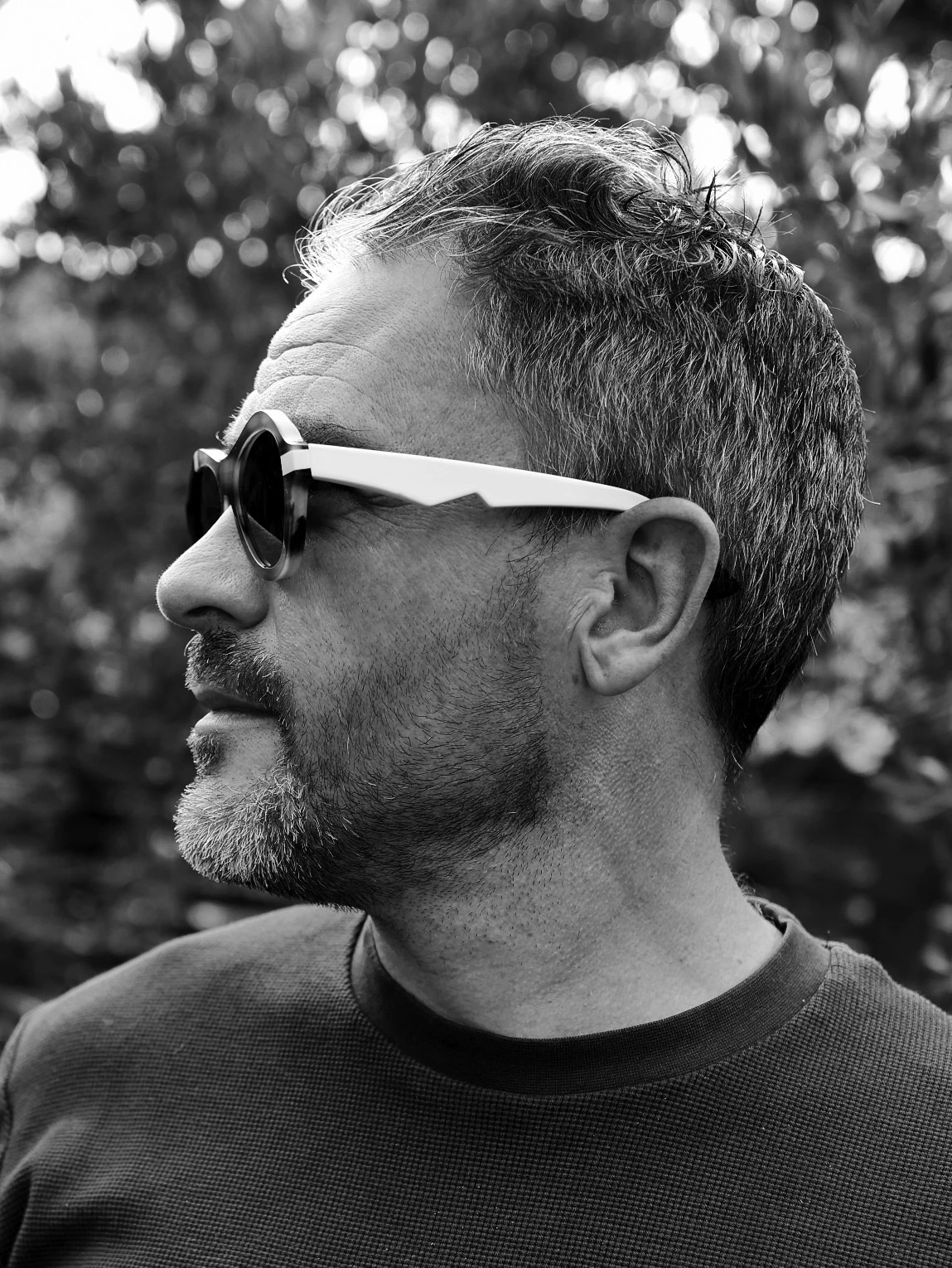 Explorer Levison Wood in Ffin ANA award-winning designer sunglasses, black and white profile