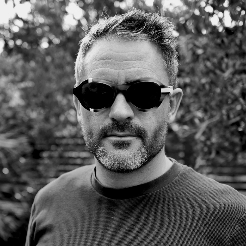 Black and white portrait of Levison Wood in Ffin ANA designer sunglasses for the Ffin adventurer story