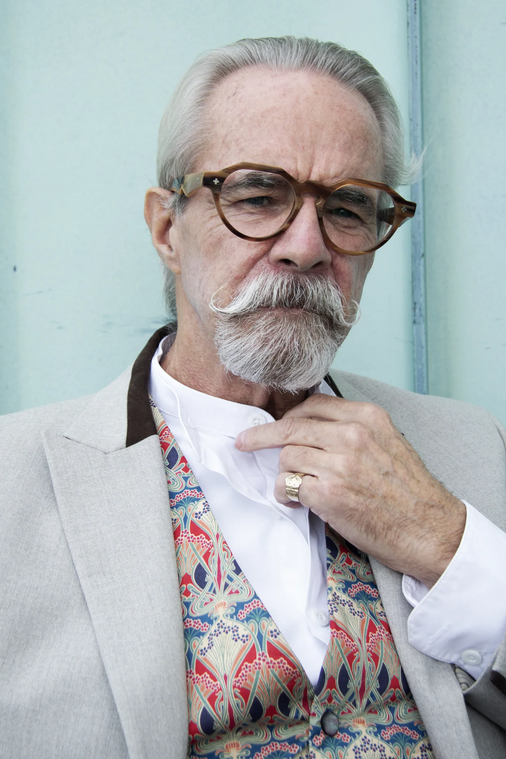 Gary in round wood-effect Ffin NON optical frames and a paisley waistcoat